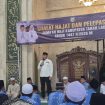 Ket.Bupati Tanah Laut memberikan sambutan saat pelepasan jamaah haji 2026, sekaligus mengingatkan pentingnya menjaga niat dan kesehatan. Foto. Ist