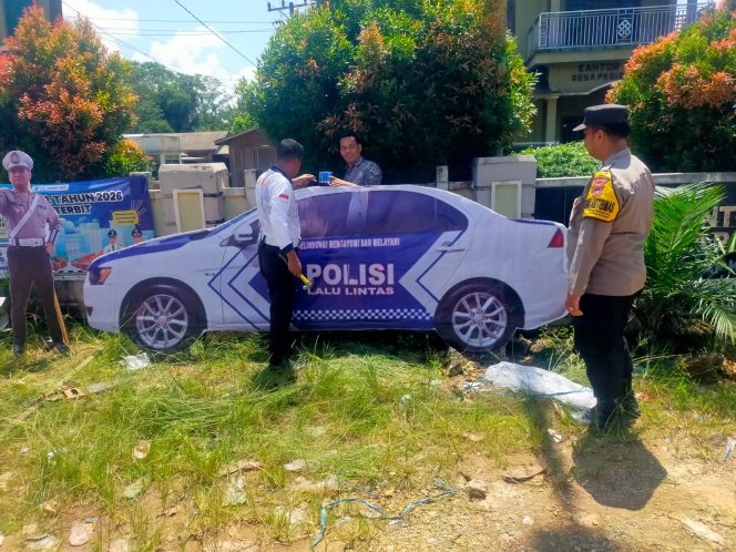 
					Polsek Kintap Pasang Replika Mobil Patroli di Titik Rawan Kecelakaan Desa Pasir Putih