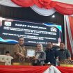Sekda Kotabaru H Eka Saprudin membacakan Nota Keuangan Perubahan APBD 2026 di Rapat Paripurna DPRD Kotabaru. (SANAK.ID/RYAN WARDANI)